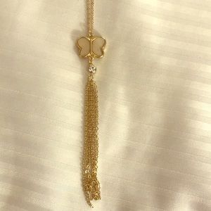 Pearly white butterfly on gold chain